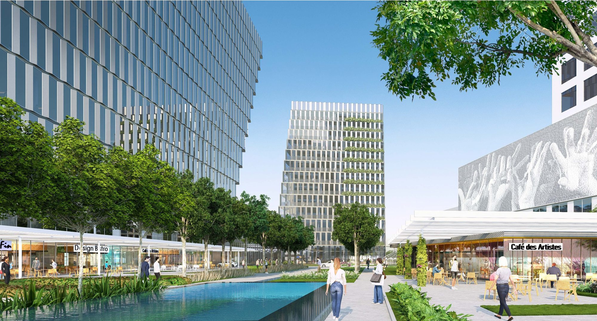 Tree-lined walkway along a reflecting pool with shops and cafés